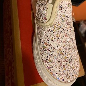 Vans Asher V Glitter Slip on sneakers.